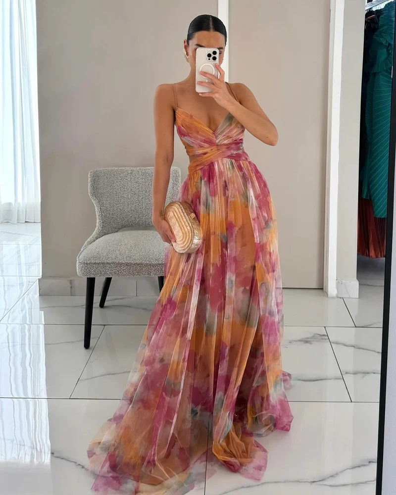 Women's floral maxi dress, long and flowing with slimming and draped cut