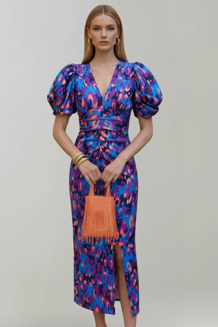 Women's airy midi dress with V-neckline, puff sleeves, and ruched waist, patterned